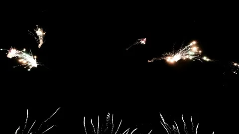 Bright Fireworks Exploding in the Night Sky Creating a Vibrant Display of Light Stock Footage 339167426