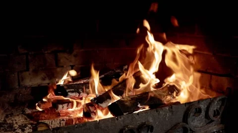 The bright flame of a burning fire in the barbecue.  Stock Footage 239471043