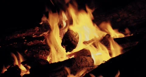 The bright flame of a burning fire in the dark. Stock Footage 160047559