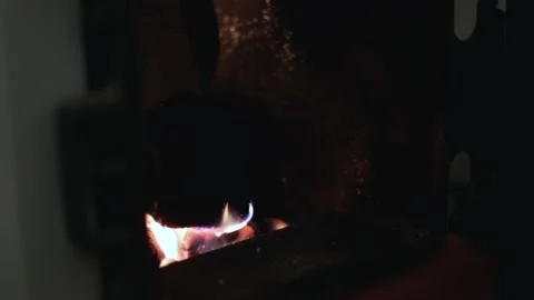 Bright flame of fire in the boiler for heating the house. Replacing electricity Video stock 237745729