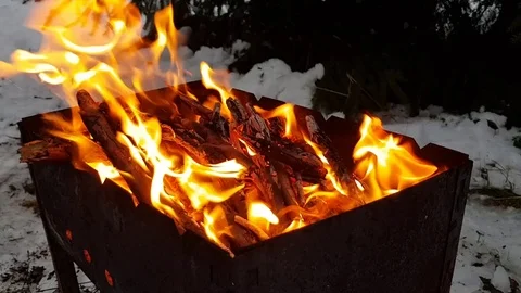 Bright flame of fire in the brazier in the open air Stock Footage 83203760