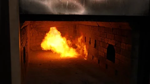 A bright flame of fire in the crematorium incinerator. Stock Footage 309182019