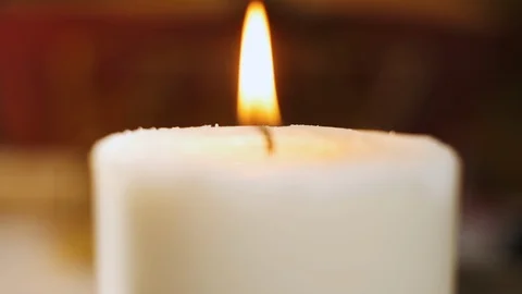 Bright Flame From Large White Candle. Vídeos de archivo 111145921