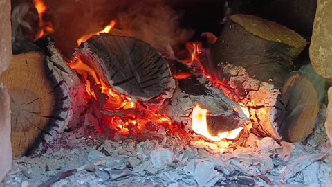 Bright flames burning on outdoor fire pit in slow motion Stock Footage 344878372