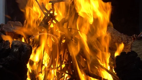 Bright flames when burning wood on the grill 4k Stock Footage 112832043