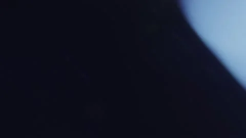 A bright flash of blue light with a white transition. Stock Footage 252381766