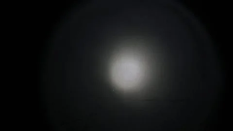 Bright Flashlight Beam Searching Dark Textured Concrete Wall Stock Footage 328476711