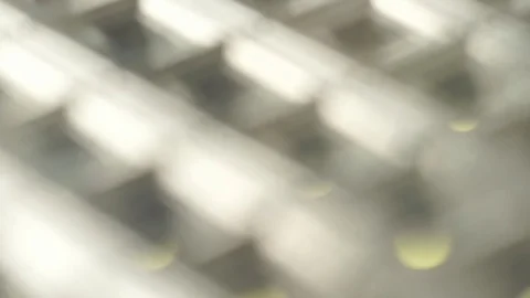 Bright flood lights background with particles and glow. Blue tint. Seamless loop Stock-Footage 73754728