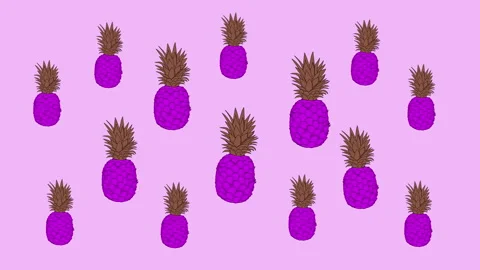 Bright funny light green background with dancing violet and green pineapples. Vj Stock Footage 132442917