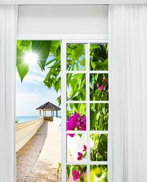 Bright Garden View Through Open Window to Seaside.. Fotos de archivo