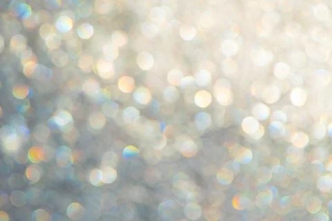 Bright glitter background: bokeh effect from many colored lights on frozen gl Stock Illustration
