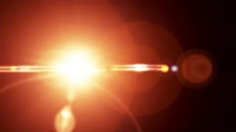 Bright glowing golden spot light with lens flare effect Video stock 141017930