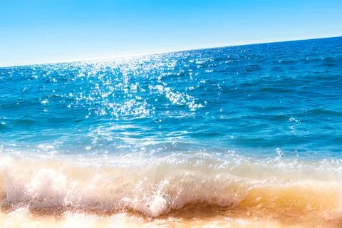 Bright glowing ocean surface Stock Photos