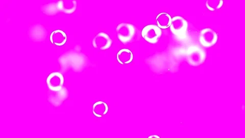 Bright glowing out of focus bubbles floating on deep pink background - HD Motion Stock Footage 81473697