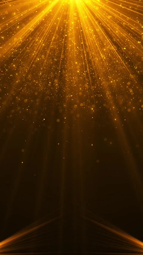 Bright gold spotlight event background crossing beams, falling glitter, and glow Stock Footage 340478257