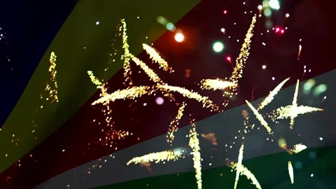 Bright golden fireworks display exploding against the national flag of the .. Vídeo Stock 343690695