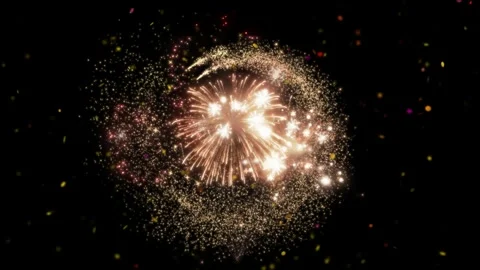Bright golden fireworks display exploding in the night sky for celebration and Stock-Footage 345017072