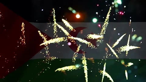 Bright golden fireworks exploding in front of the flag of Western Sahara ce.. Video stock 343690732