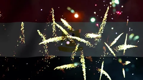 Bright golden fireworks exploding in front of the national flag of Egypt Stock Footage 343690738
