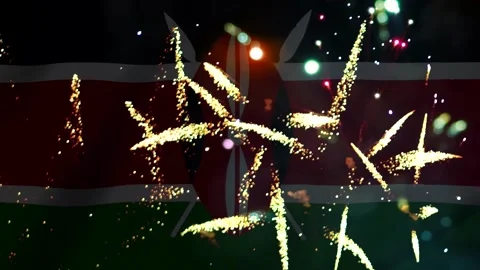 Bright golden fireworks exploding in front of the national flag of Kenya re.. Видео 343690742