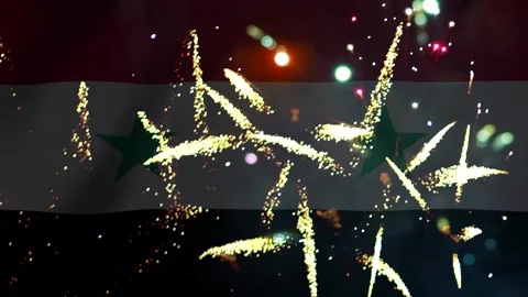 Bright golden fireworks exploding in front of the waving flag of Syria cele.. Video stock 343690758