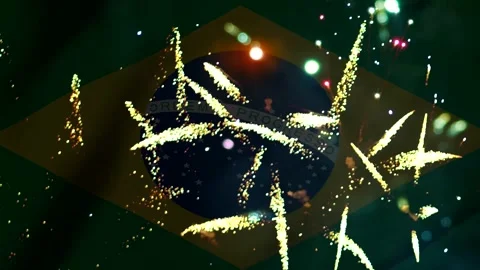 Bright golden fireworks exploding in the night sky over the national flag o.. 库存影片 343690823