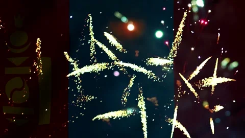 Bright golden fireworks exploding in the night sky over the national flag o.. Video stock 343690859