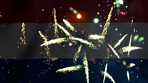 Bright golden fireworks exploding in the night sky over the national flag o.. Video stock 343690861