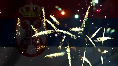 Bright golden fireworks exploding in the night sky over the national flag o.. Vídeos de archivo 343690862