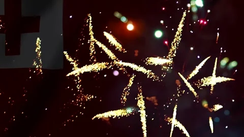 Bright golden fireworks exploding in the night sky over the national flag o.. Stock-Footage 343690886