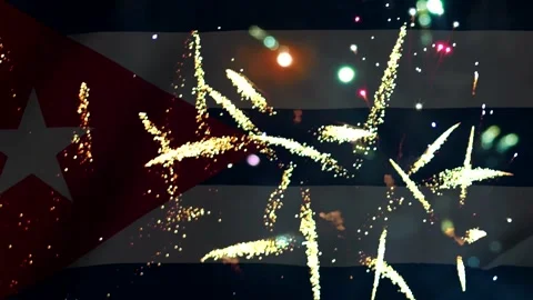 Bright golden fireworks exploding over the national flag of cuba during a n.. Stock Footage 343690939
