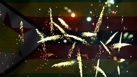 Bright golden fireworks exploding over the national flag of zimbabwe during.. Video stock 343690985