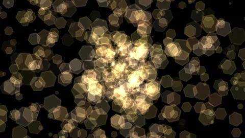 Bright Golden Light Bokeh Effect with Hexagon Shapes on Black Background Stock Footage 337956849