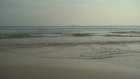 Bright Golden Sand. Waves Break On The Sandy Shore. Slow Motion Stock Footage 112591552