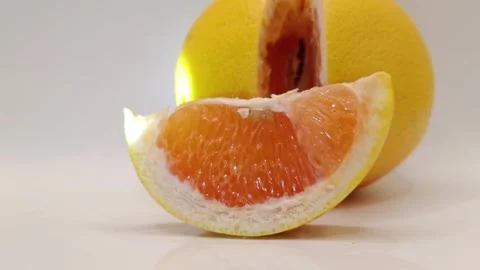 Bright grapefruit on white Stock Footage 331954107