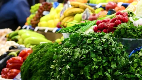 A bright green large bunch of dill with rich and dense twigs on the counter.. Stock Footage 329868907