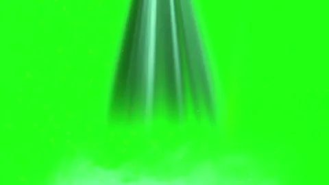 Bright green laser beam shining through dark fog creating dramatic light effect 库存影片 343481014
