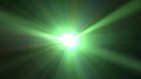 Bright green light bursts from center, radiating sharp rays Stock Footage 345421653