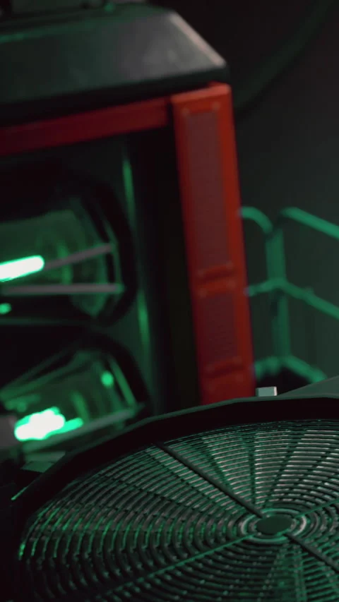 Bright green lights glow in a modern high tech equipment setup at night Stock Footage 337956869