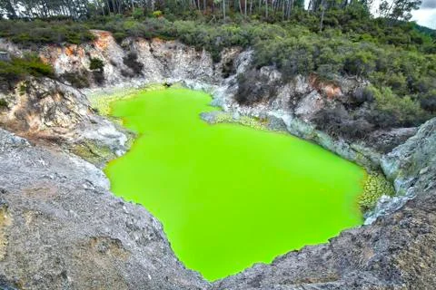 A bright green pool called Devil's Bath in New Zealand Stock Photos
