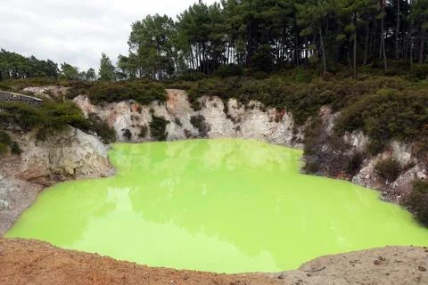 A bright green pool called Devil's Bath, colored by volcanic minerals at the Wai Stock Photos