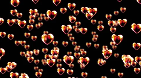 Bright heart bubbles float on black background Stock Footage 63395578