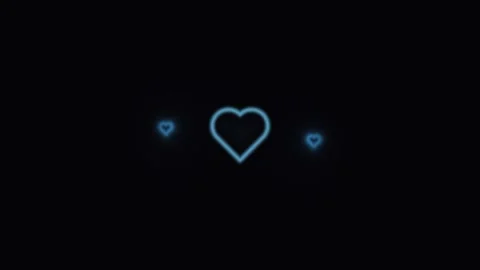Bright heart shapes glowing in dark background Stock Footage 338289042