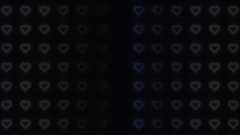 Bright hearts dance in a on a dark background Stock Footage 338230657
