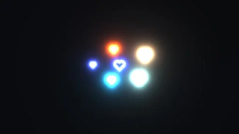 Bright hearts in different colors appear on a dark Stock Footage 339304342