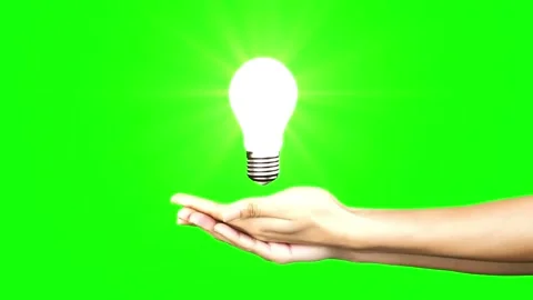 Bright Idea in Hand Concept on Green Background Video stock 333284680