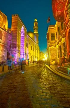 The bright illumination of historical edifices in Al-Muizz street in Cairo, E Stock Photos