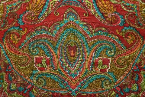 Bright Indian pattern on a silk scarf. Stock Photos