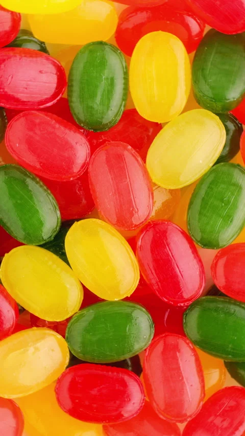 Bright jelly beans in abstract candy texture Vídeo Stock 344998436