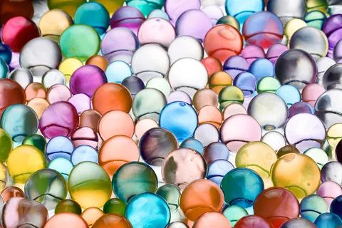 Bright juicy balls of hydrogel in huge quantities Stock Photos